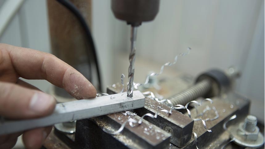 drilling hole on drill press vise